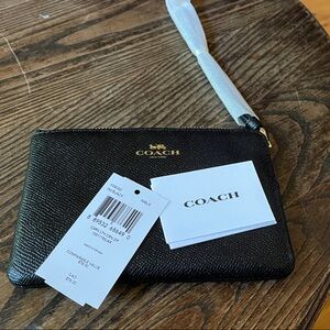 New with tags Coach Black Textured Wristlet 6” x 4”